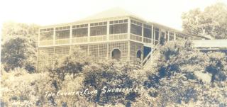 The Community building or "Clubhouse" that stood along the shoreline 1921-1987 with a bridge over the gully on its right
